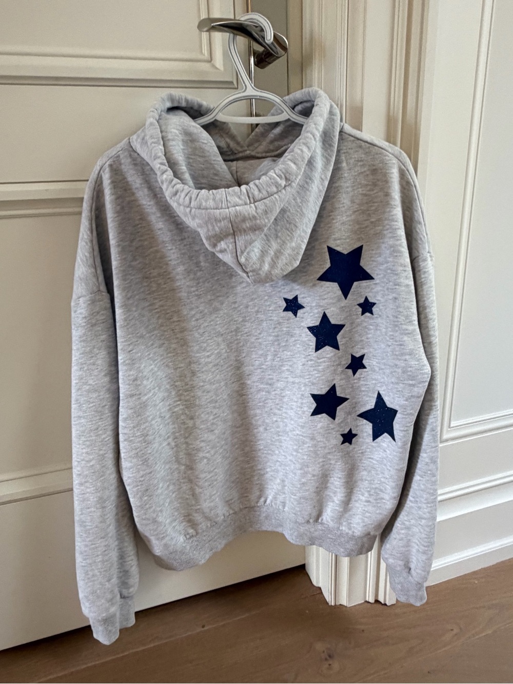 Subdued Grey Hoodie With Blue Stars